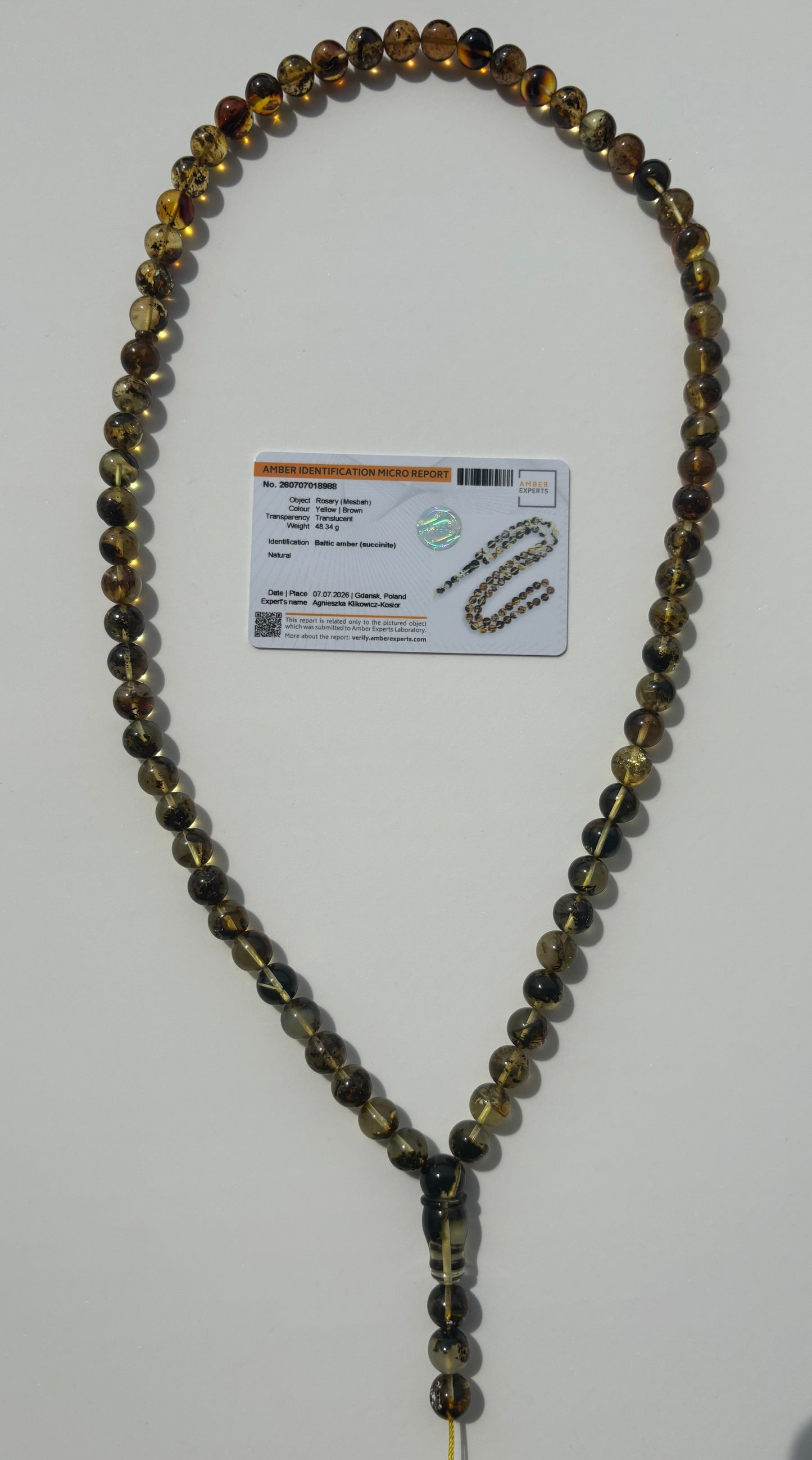 Collector-grade multicolor Baltic amber prayer beads with certificate.