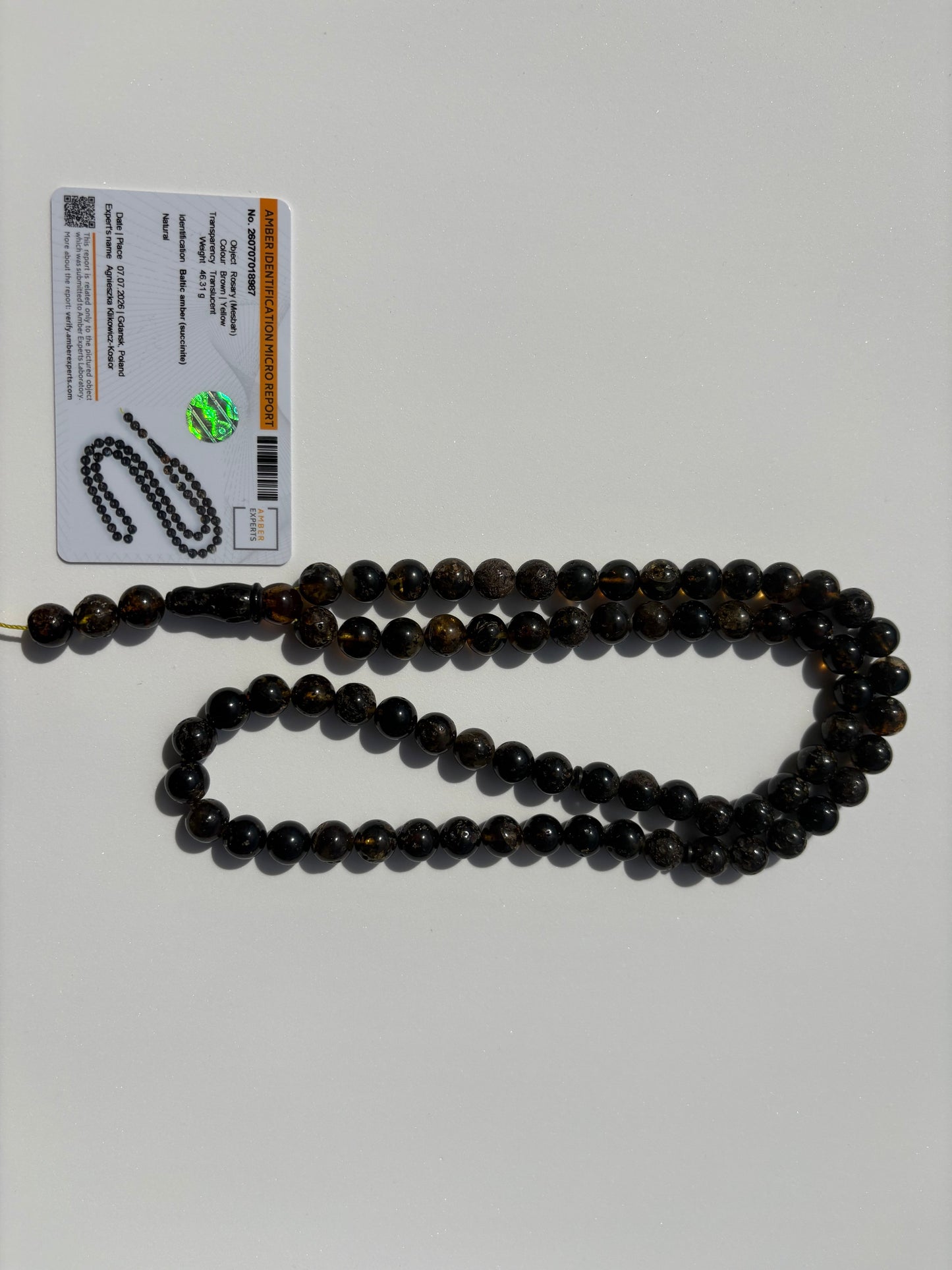 Certified Baltic succinite amber misbaha featuring 72 round amber beads.