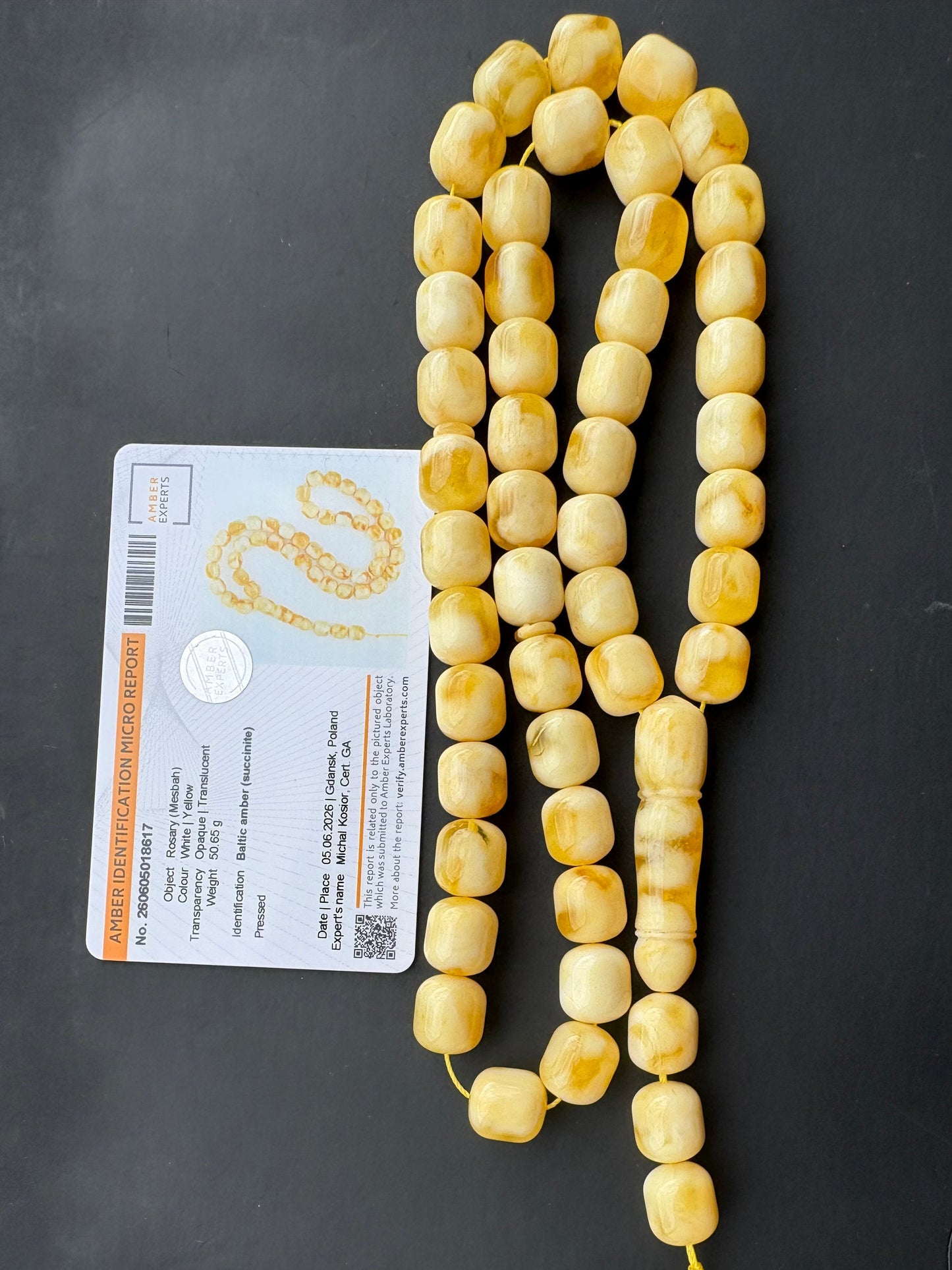 Tetibel Baltic Amber Mesbah rosary with 48 certified pressed white and yellow barrel beads, measuring 12x11mm and weighing 50.65g, with Amber Experts certificate from Gdańsk.