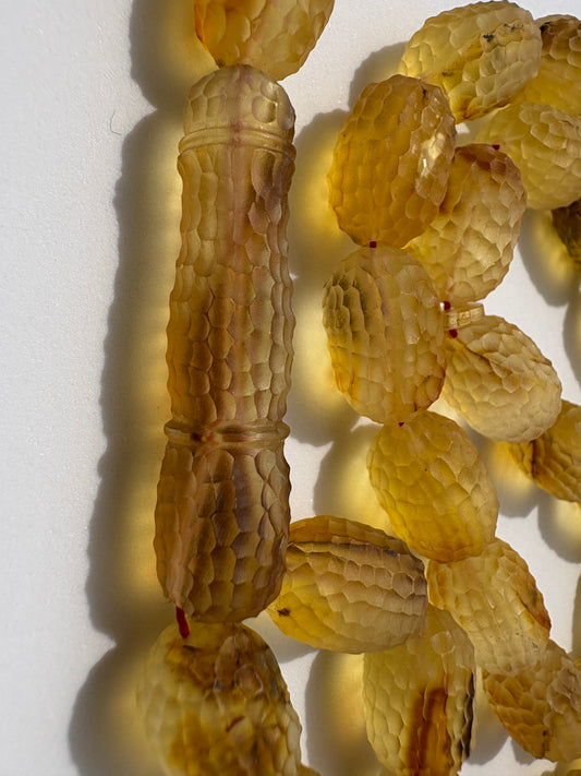 Certified Baltic amber Tesbih with 41 carved barrel-shaped honey amber beads.