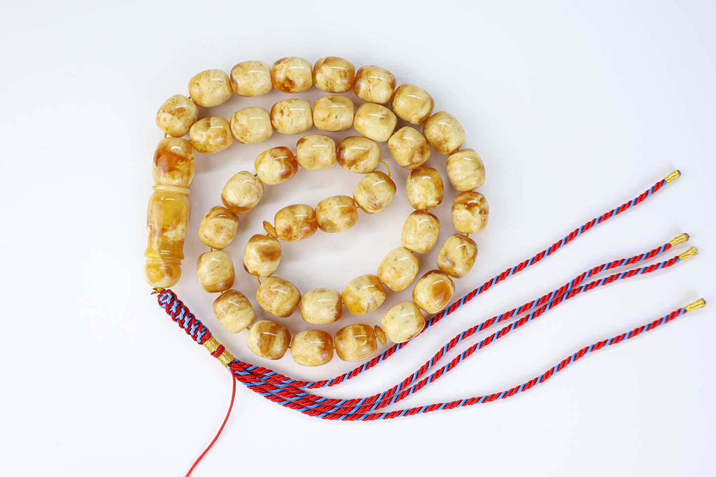 Pressed Baltic amber prayer beads 39 beads 13.5x12mm 59.95g with handmade red blue and gold Doha Qatar tassel and lab certificate from Tetibel Amber Jewels
