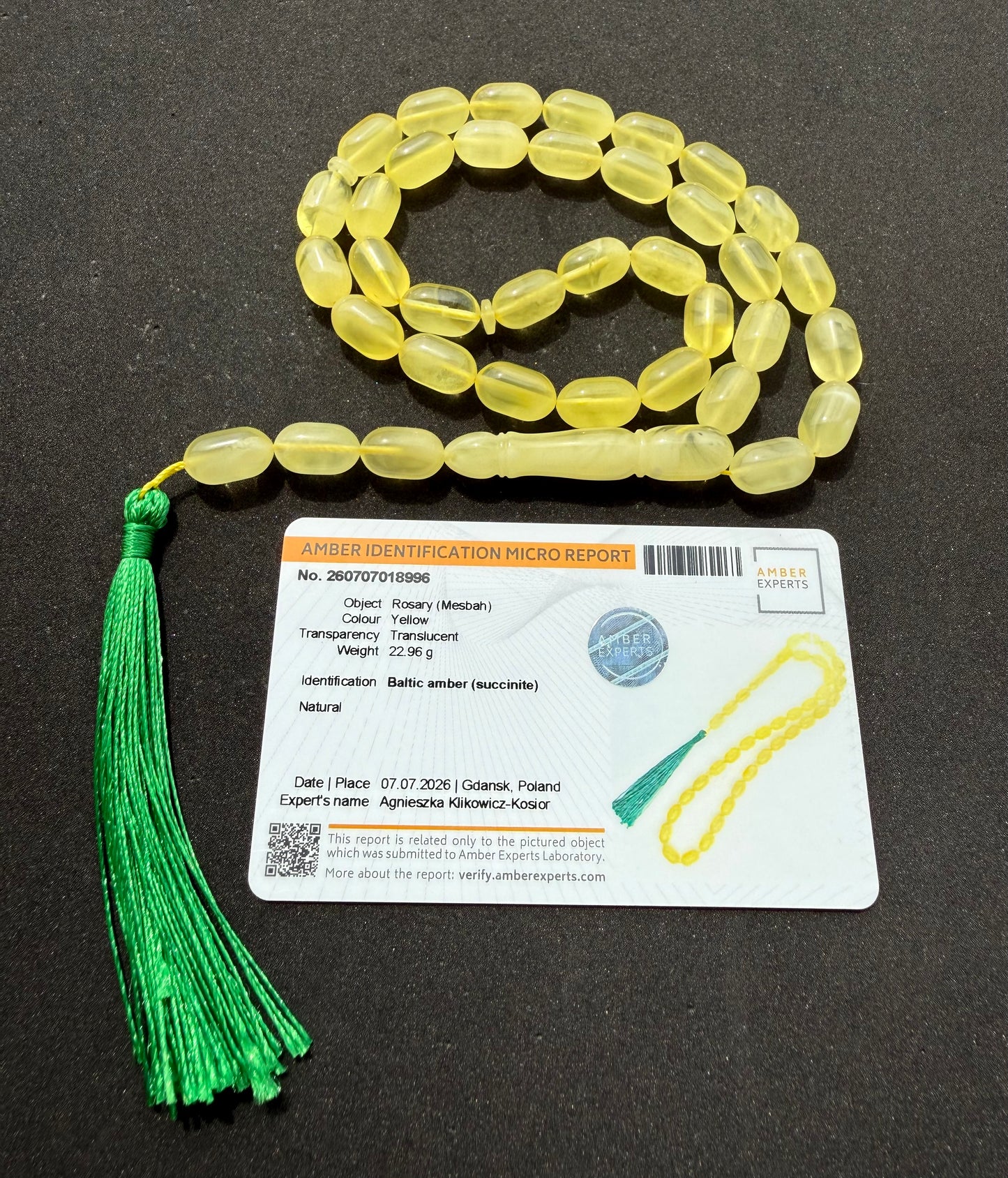 Natural Baltic amber Tesbih with 36 translucent lemon yellow olive-shaped beads.