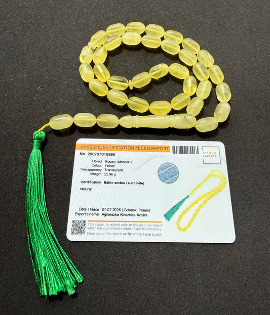 Natural Baltic amber Tesbih with 36 translucent lemon yellow olive-shaped beads.