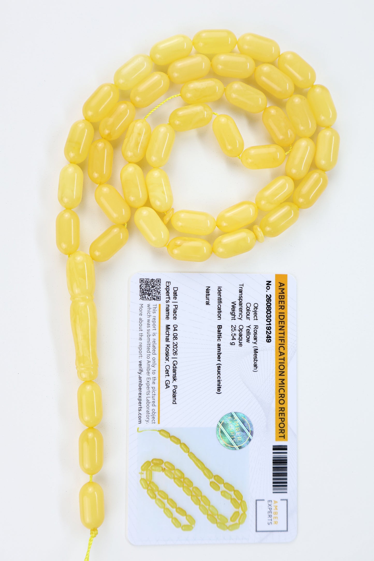 Certified Baltic amber rosary with 42 creamy lemon-yellow succinite beads measuring 14.4x7.5mm and weighing 25.54g.