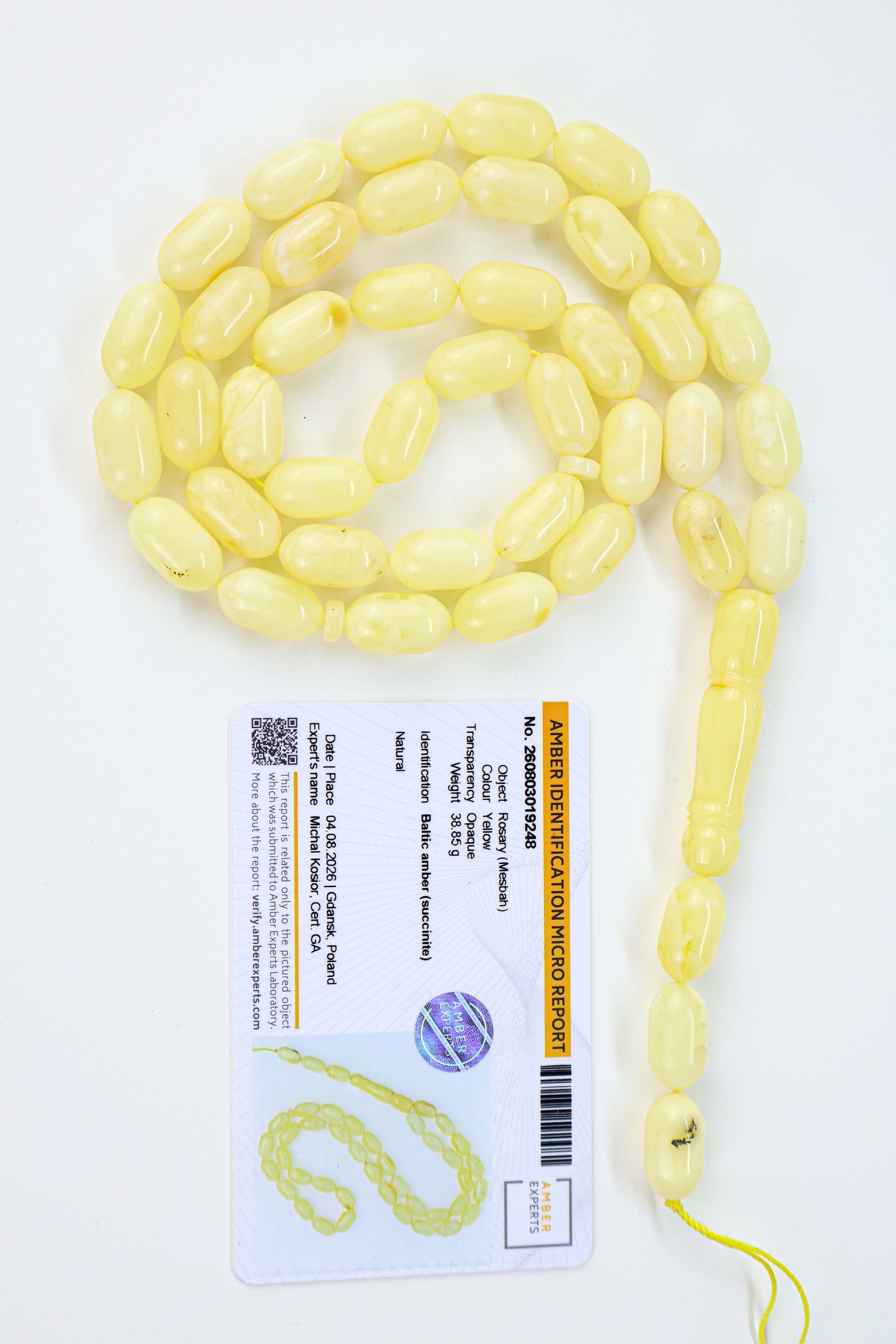 Genuine Baltic amber Mesbah featuring 42 oval beads measuring 16.3 × 9 mm.
