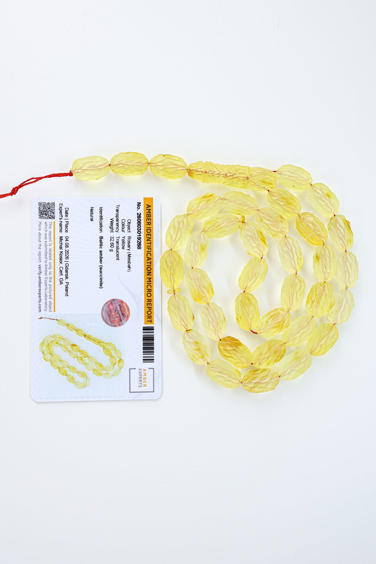 Certified natural hand-carved translucent yellow Baltic amber misbaha rosary with 36 beads measuring 16x9.5 mm by Tetibel.
