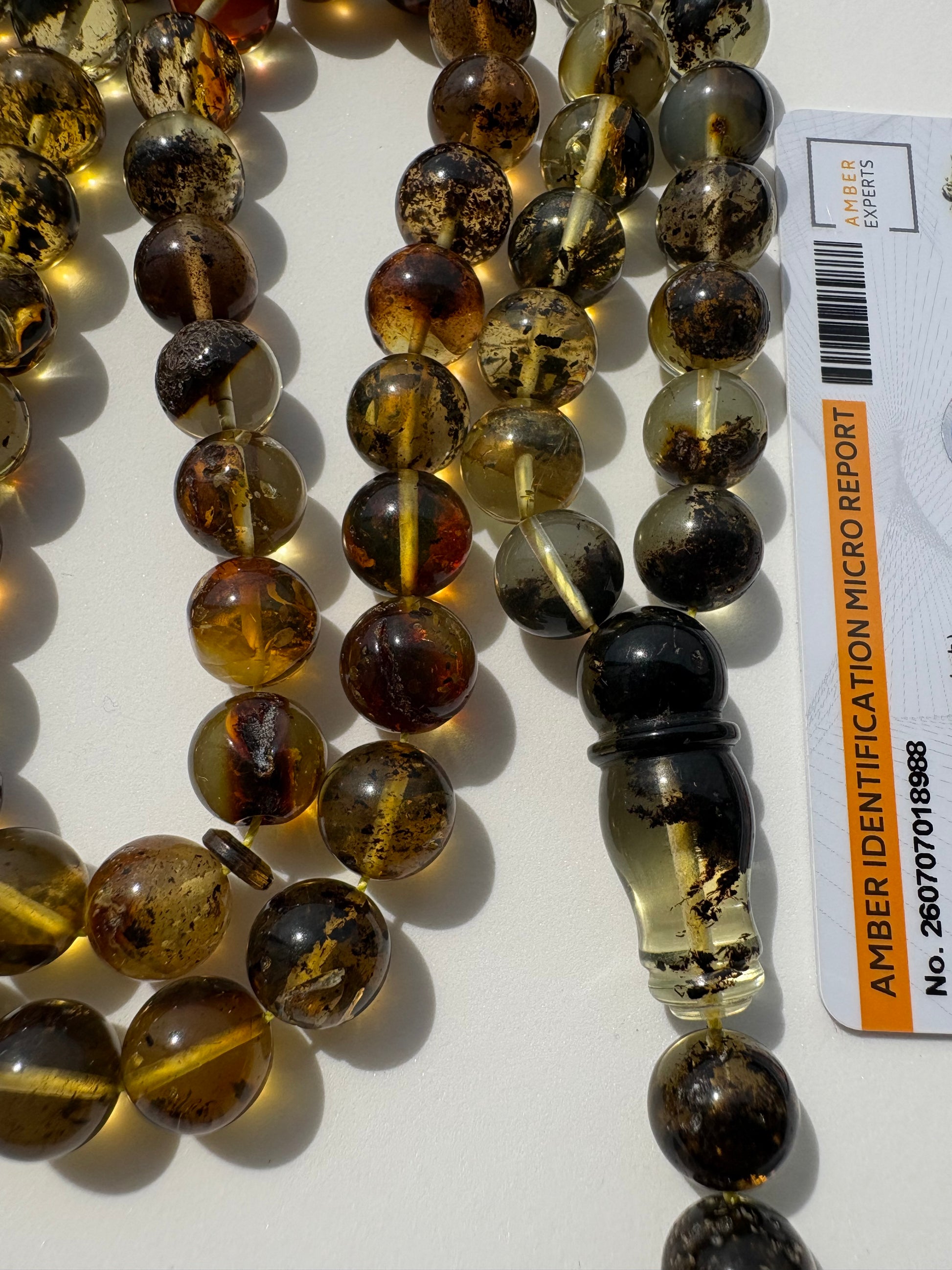Luxury Baltic amber Tesbih with polished 10 mm spherical beads.