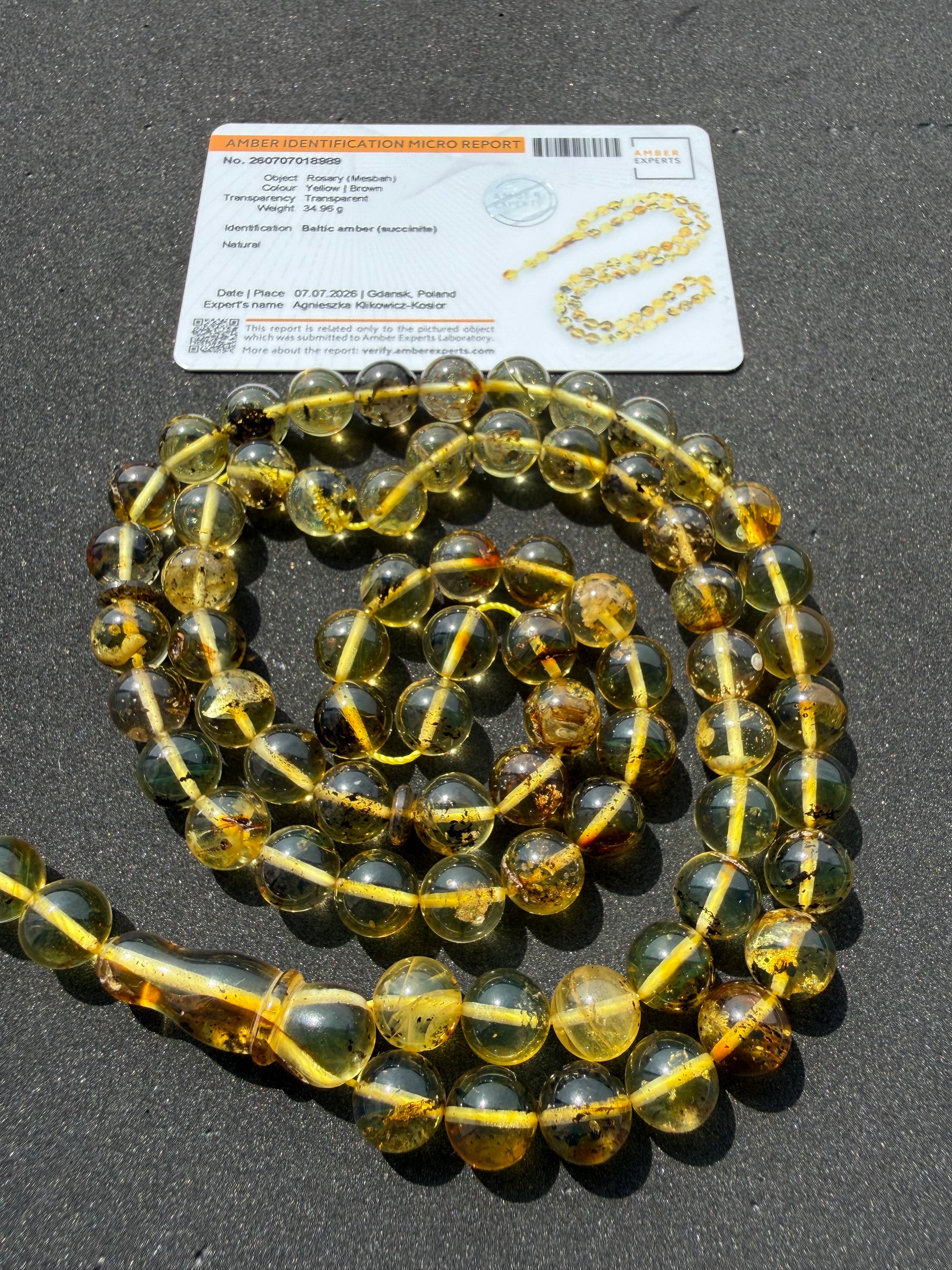 Natural Baltic amber Tesbih with 72 transparent round honey amber beads measuring 9.3 mm.