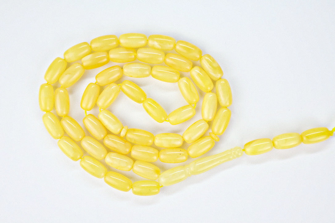 Authentic opaque butter yellow Baltic amber misbaha strand with matching amber imam head and 48 beads.