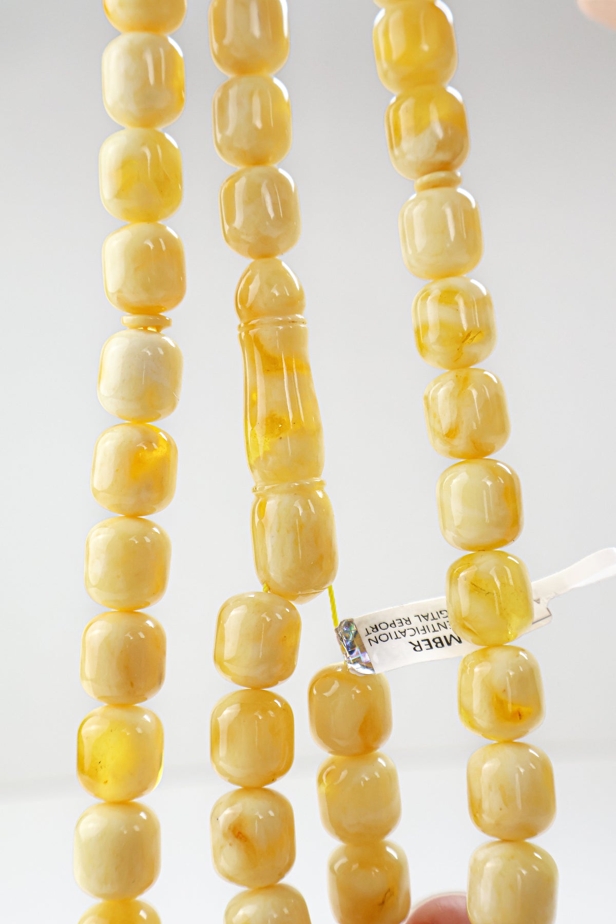Certified white and yellow Baltic amber misbaha rosary weighing 50.65 grams by Tetibel.