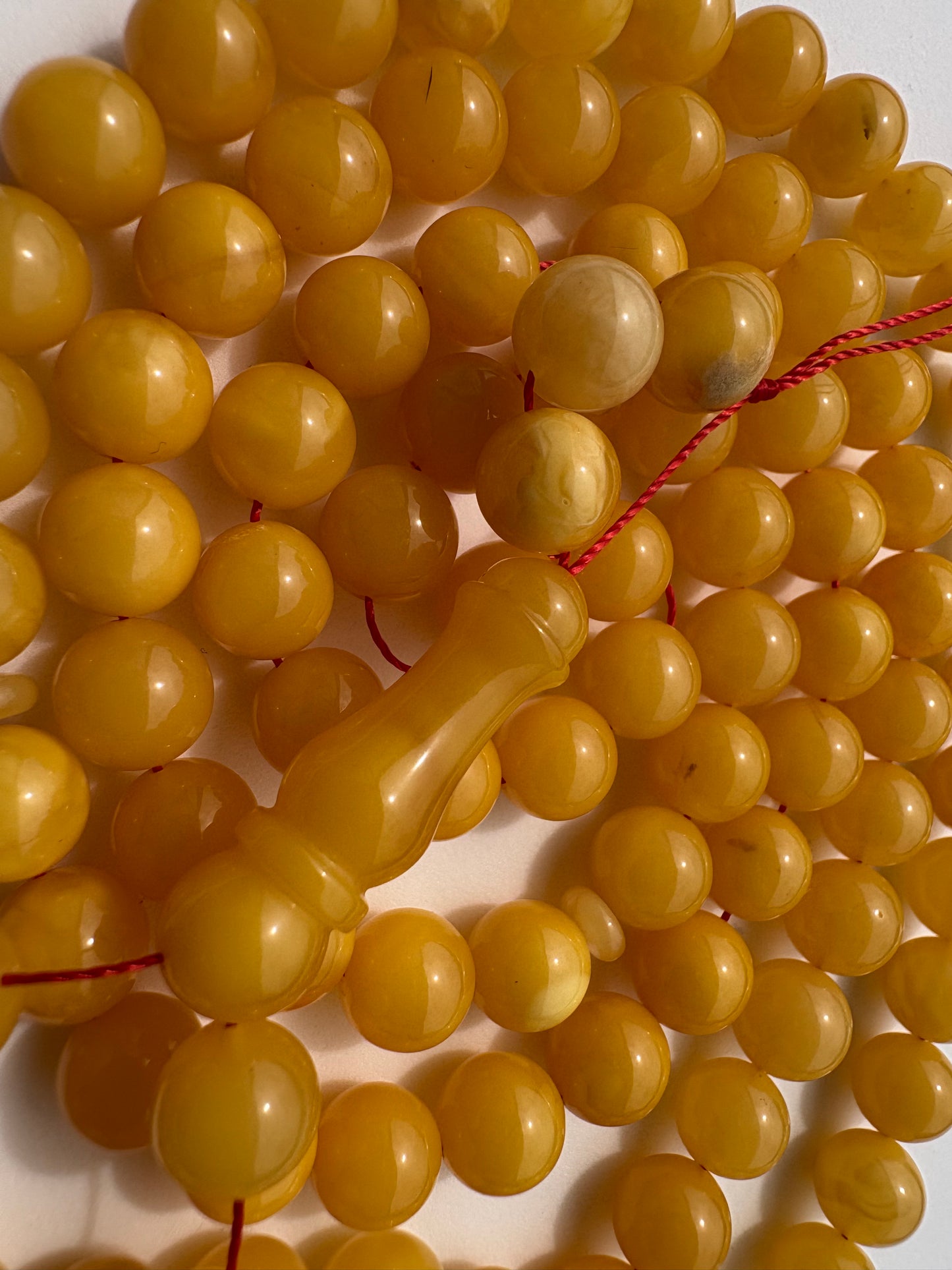 Handmade Baltic amber Tesbih featuring 102 round 7.5 mm beads.