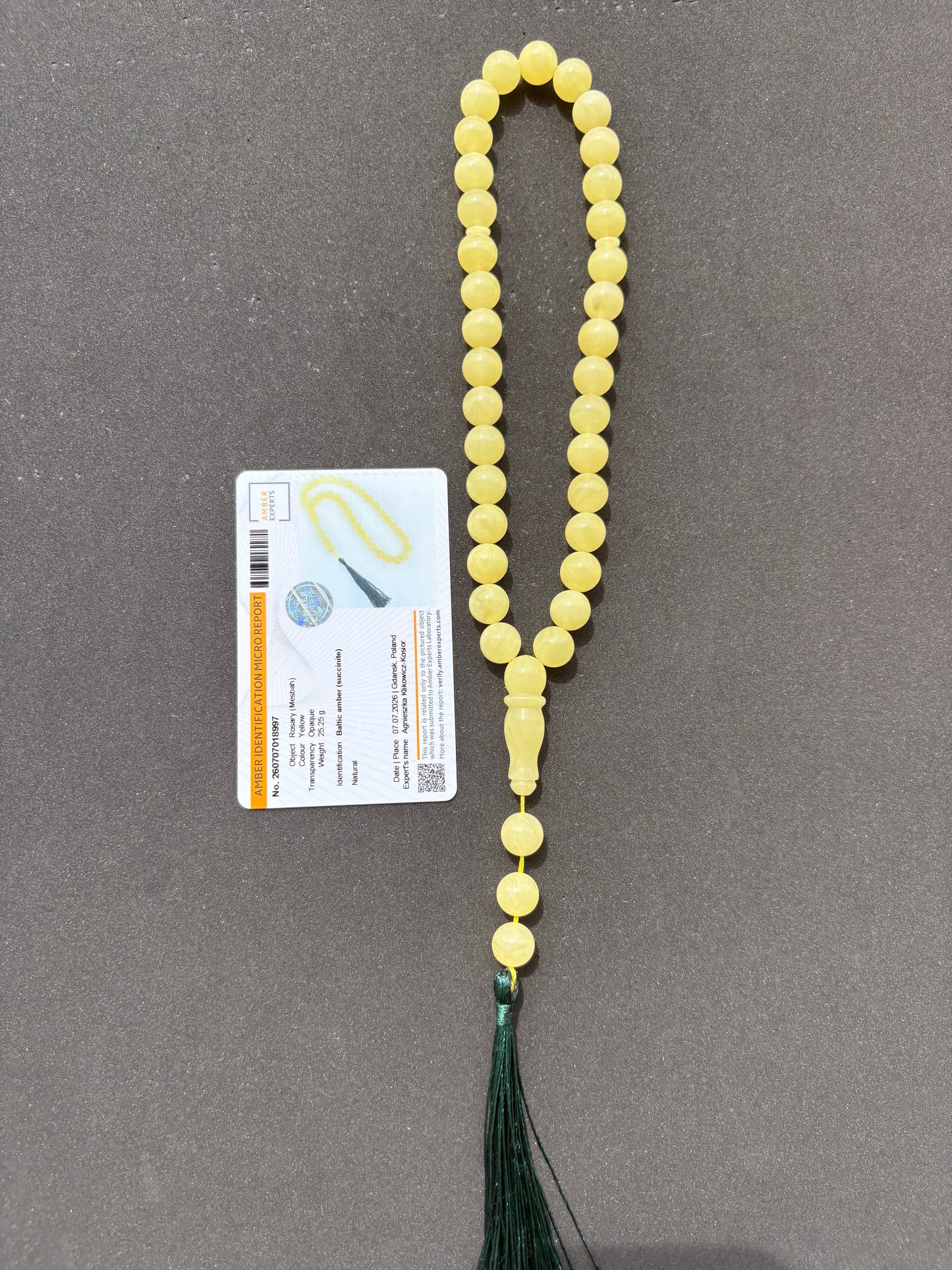 Certified Baltic amber Misbaha featuring polished 10.3 mm spherical beads.