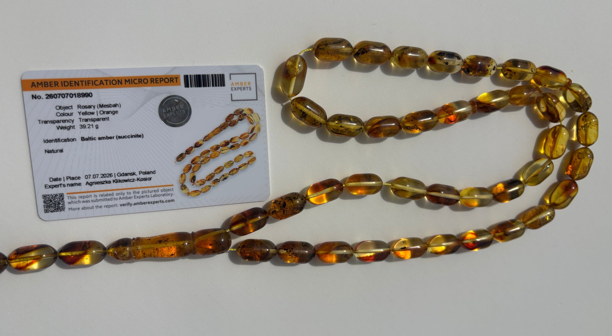 Certified Baltic amber Misbaha featuring cognac and honey olive beads.